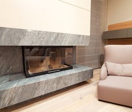 modern gray granite fireplace surround